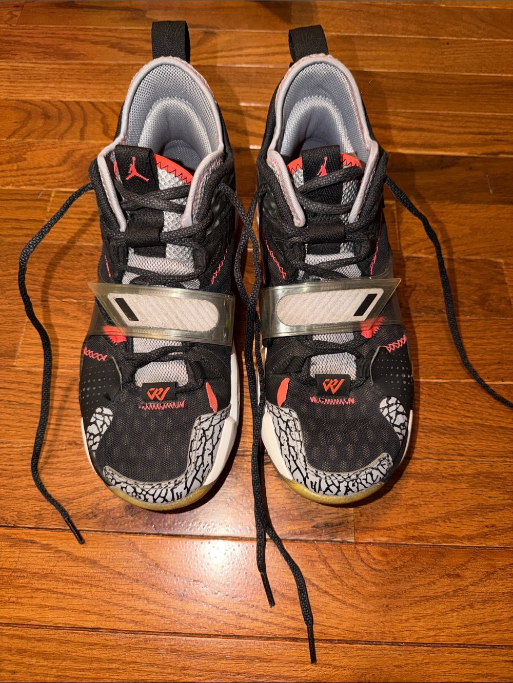 Nike Air Jordan Mens Black and Grey Basketball Shoes with Pink Accents